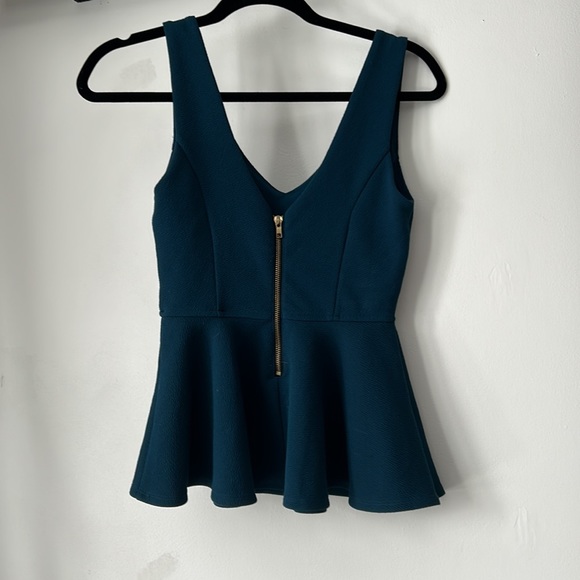 Women’s deep green peplum top - Picture 2 of 3